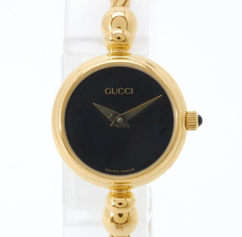 Montre à quartz femme neuve Batt[NEUF] vintage Gucci 2700,2,2,L cadran doré noir JAPON