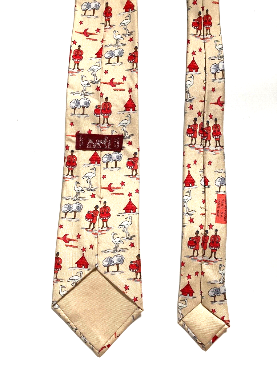 Cravate Vintage Hermès - Motif Kenya/Afrique (flamants, Tambours, Huttes) - Soie 100% - Couleur Ivoire - Années 1990