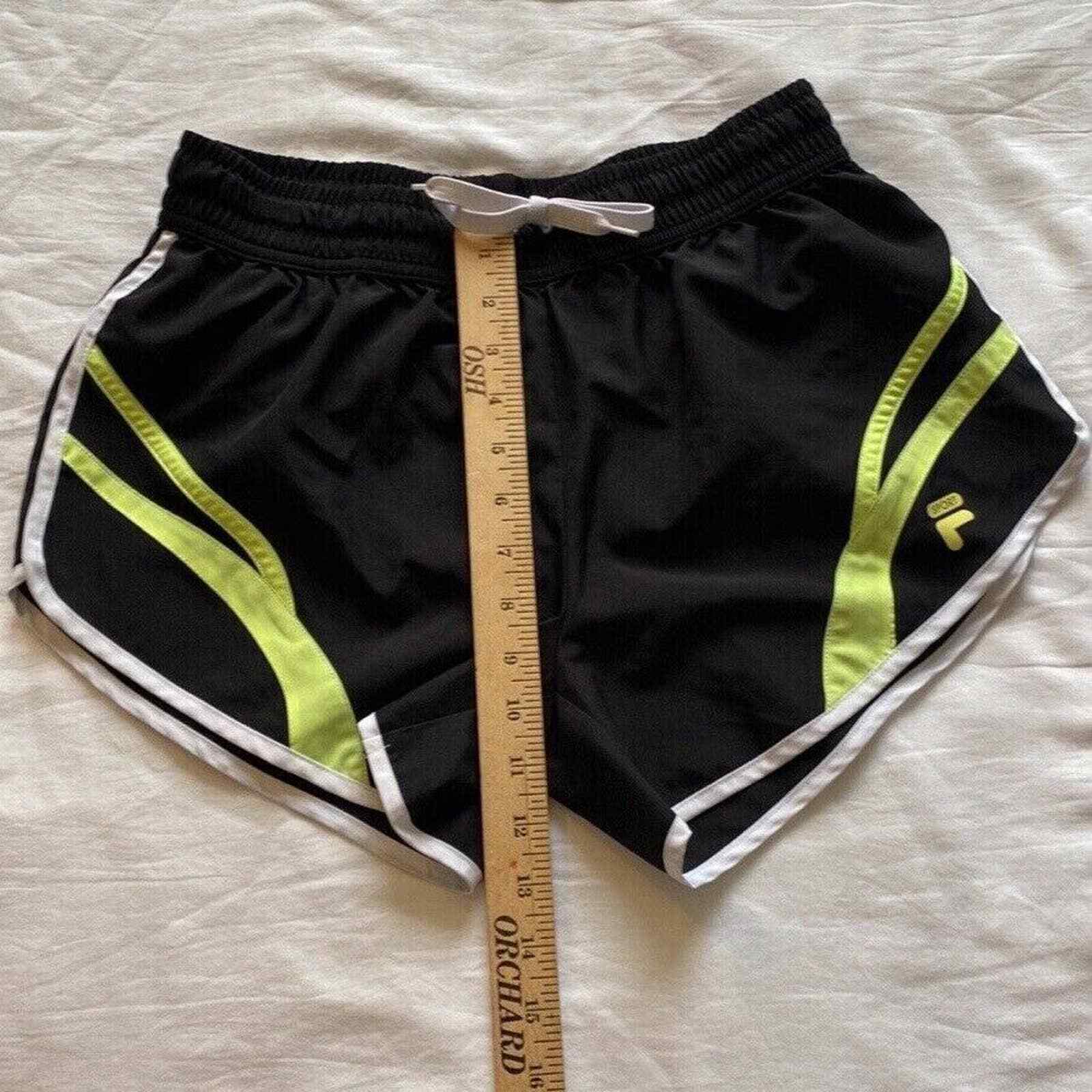 Pantaloncini da corsa Fila donna sm neri riflettenti fluorescenti giallo verde foderati di sicurezza