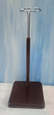 Doll Holding Stand with Wooden Base. 26cm extends to 34cm