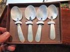 Set Of 4 Mother Of Pearl Spoons with metal bands in box