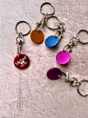 Personalised coloured metal trolley coin, pound shape coin, trolley