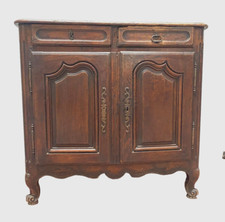 meuble deux portes deux tiroirs en chêne massif mouluré . XIX siècle .