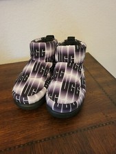 Women's Uggs. NWOT. Size 5. Black and white in color.