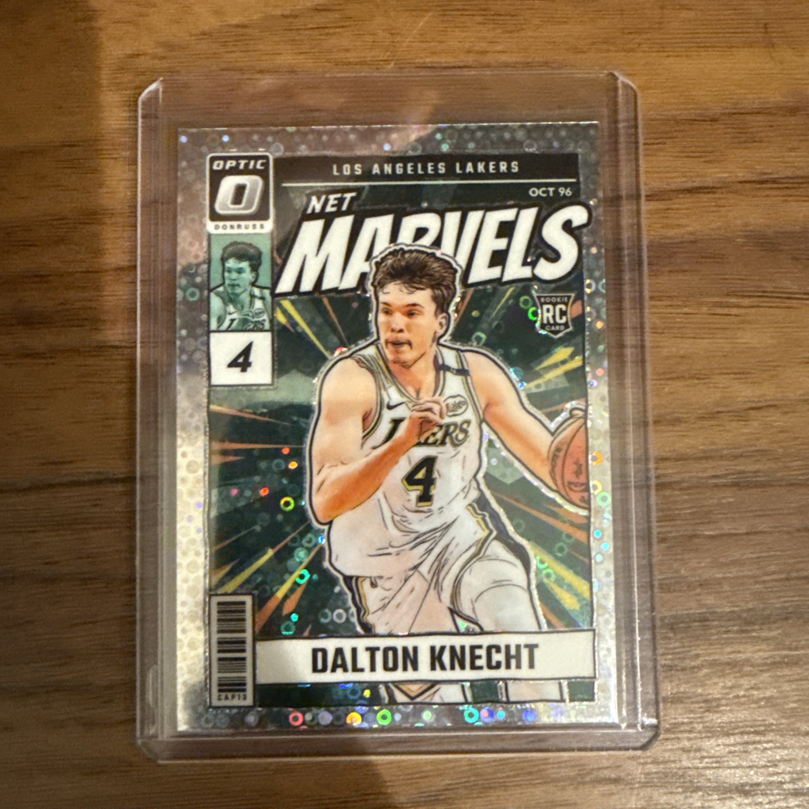 2024-25 Panini Donruss Optic Net Marvels Dalton Knecht #16 (RC) Disco Prizm.