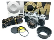 Olympus OM1 OM-1 MD + Zuiko 50mm f1,8 2 filtri paraluce cinghia 2 libretti tappo