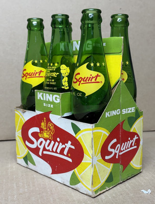 SQUIRT  SIX PACK.....Six (10oz) bottles with cardboard carrier (1962)