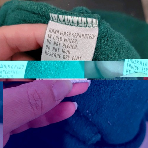 Hand wash label on dark green Vtg 90s Ralph Lauren women’s 1/4 zip pullover with turquoise fabric and white printed text.