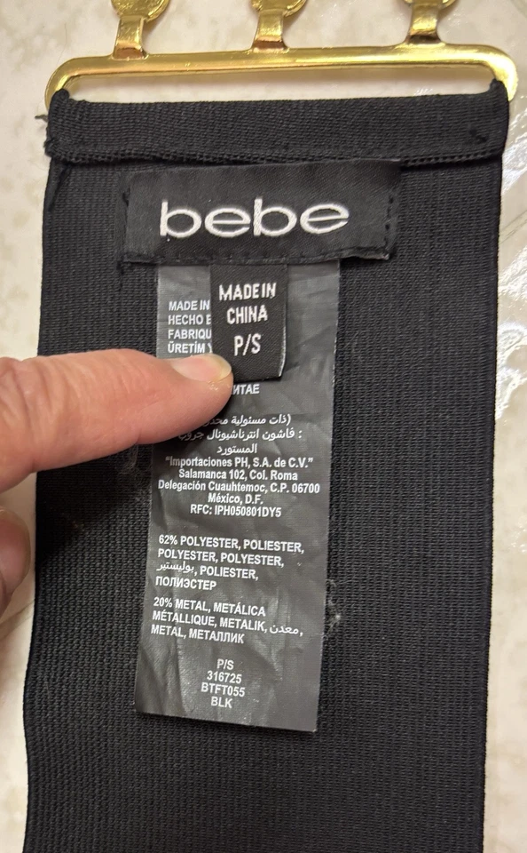 Cinturón Bebe ancho llamativo con pluma negro elástico talla S Foto 4 de 4