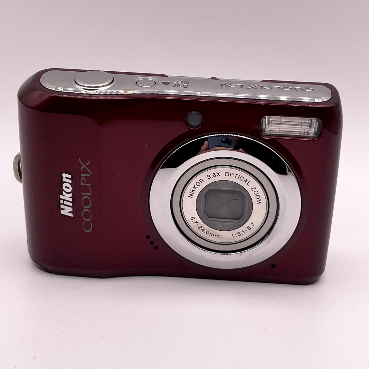 Nikon Coolpix L20 10.1MP Digital Camera – Red – Battery Cover