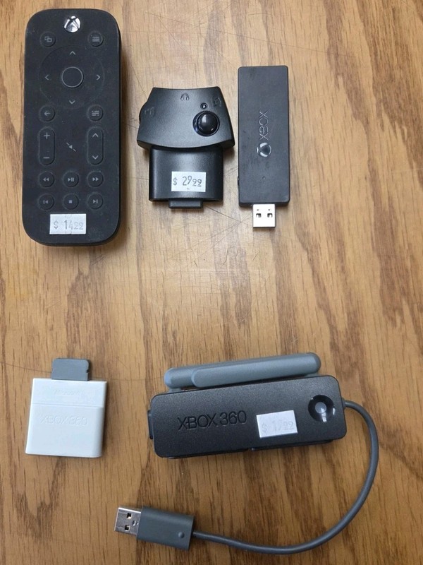 Random Xbox And Xbox 360 Tv Remote, Headset Communicater, USB Drives, And 64 MB