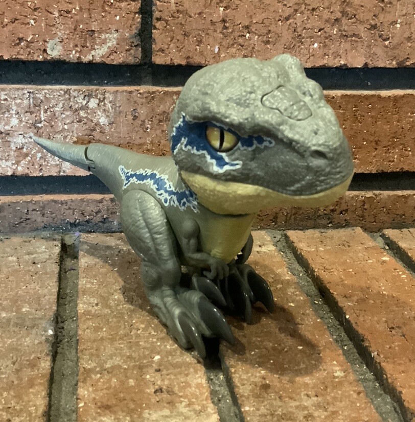 Jurassic World Primal Pal Velociraptor juguete electrónico sonidos/movimientos