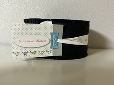 Riley Blake Confetti Cotton Solid 2.5" Rolie Polie - Solid Black