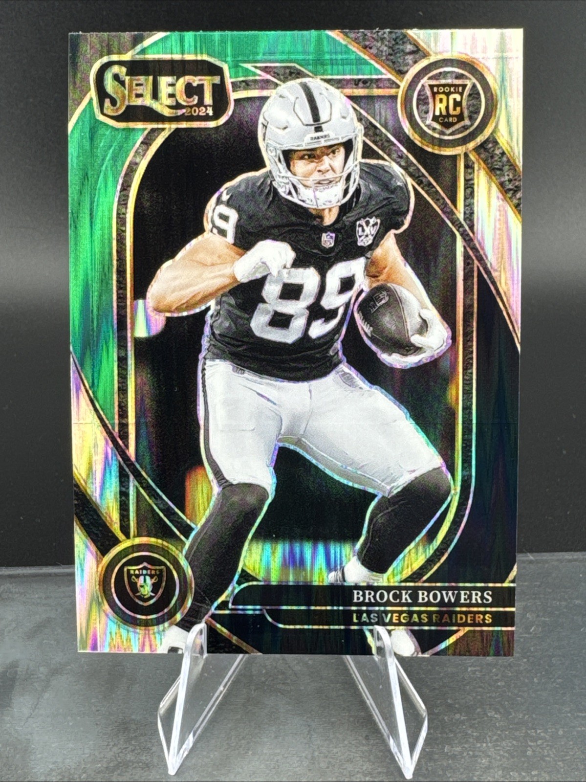 2024 Panini Select #222 Brock Bowers Black & Green Prizm Shock Las Vegas Raiders