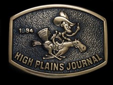 TG07119 NOS VINTAGE 1984 HIGH PLAINS JOURNAL SOLID BRASS BTS BELT BUCKLE