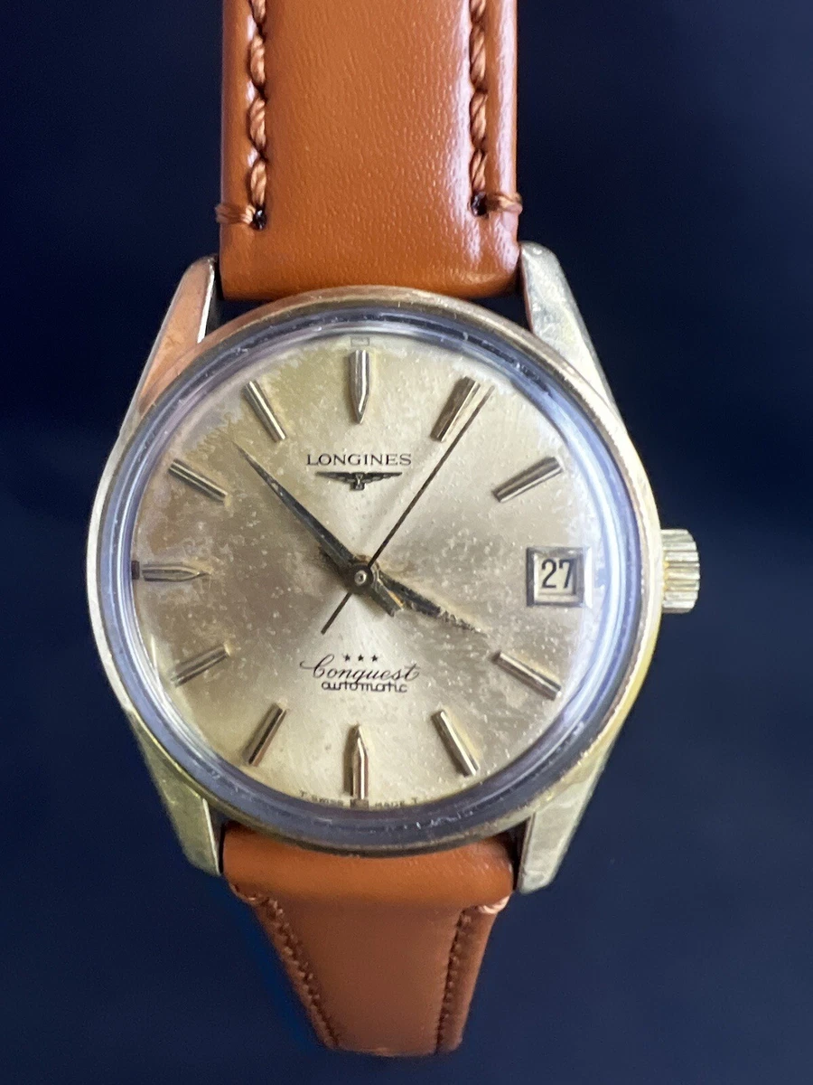 VINTAGE LONGINES CONQUEST AUTOMATIC DATE 14K GOLD AND STEEL CAL291