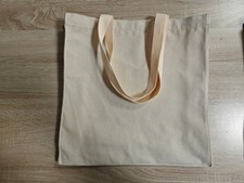 This heavy-duty cotton canvas grocery tote bag is designed for large shopping