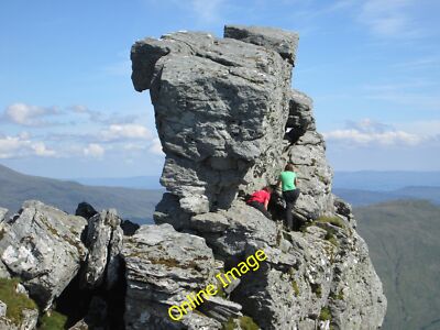 Photo 12x8 Two people climbing the rocky outcrop of u00e2u0080u009cThe  c2014