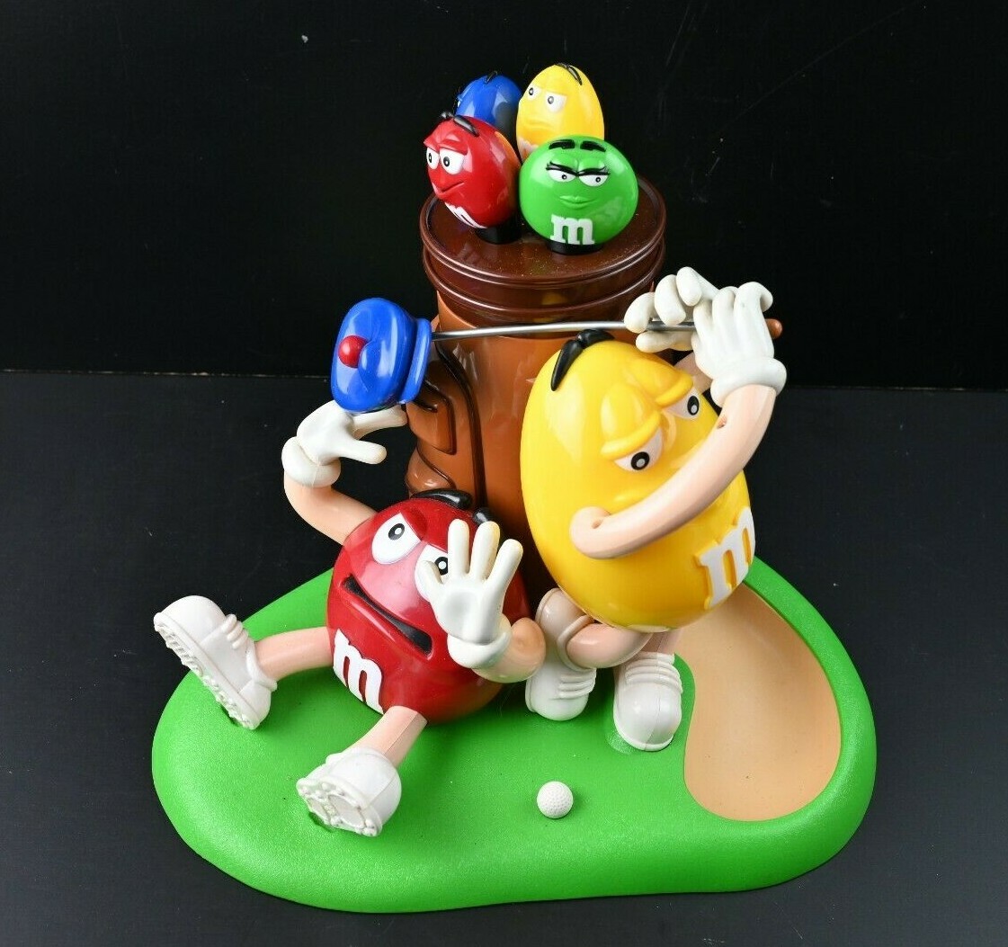 M&M's Muligan-Ville キャンディディスペンサー Amazon.com: M&M's Mulligan Ville Candy Dispenser: Food
