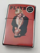 ZIPPO 21211 PLAYMATE OF THE YEAR OCT '66 on HIGH POLISH CHROME Lighter- JUL '06 