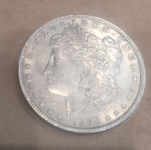 1886 O Morgan Silver Dollar $1 Coin 0.9 Fineness Uncertified US Collectible