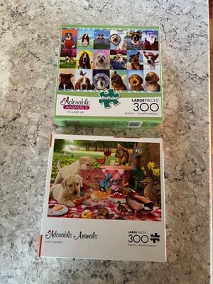 2 Buffalo puzzles 300 pieces each Adorable Animals Picnic Raiders & It's a Ruff 