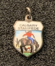 Vintage Calgary Stampede Bull Riding Silver Plated  Metal Crest Pendant