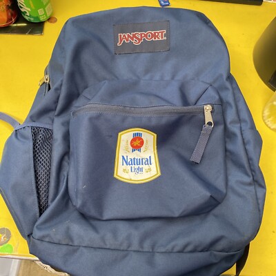 blue and yellow jansport backpack SuperBreak Plus With a side H2O pouch and a top accessory pocket JanSport Superbreak Plus Surreal Sunflowers