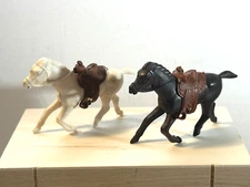 REL 60mm soft plastic pair of REL horses with Marx original saddles.