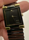 Vintage Seiko Women's Quartz Watch 2P20-5C99 Black & Gold Tone Tank Case