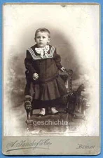 Photo, large, small child standing on a chair with wooden horse, around 1900!!!