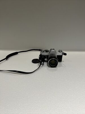 Canon TL QL 35mm Film SLR Camera FL 35mm Lens