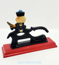 Vintage Cast Iron Nut Cracker Painted Figural on Red Wood Base USA