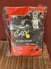 New In Bag Halloween 41" Vinyl Black Cape for all sizes.