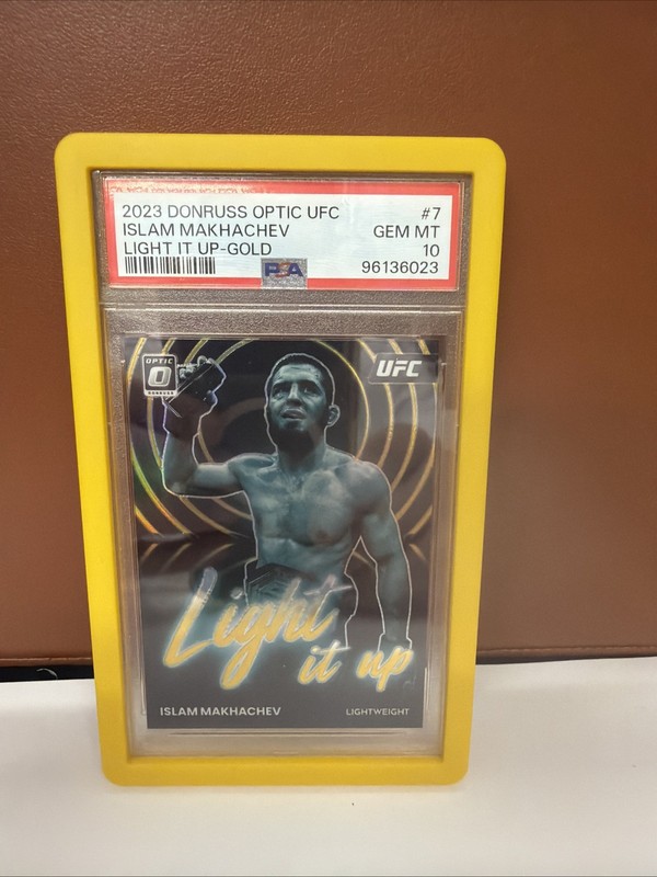 2023 Donruss Optic UFC Islam Makhachev PSA 10 Light It Up Gold 9/10