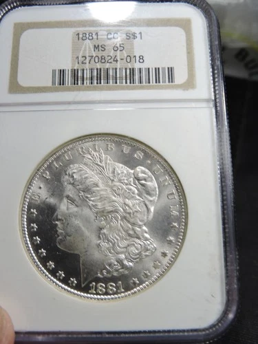 1881-CC Morgan Silver Dollar - NGC MS65 - Beautiful PQ Example with clean cheek