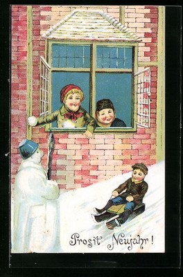 Ansichtskarte Junge auf dem Schlitten, Schneemann 