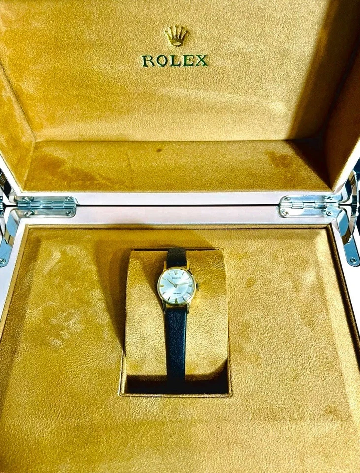 Reloj Rolex de oro amarillo de 18 quilates con esfera plateada de precisión 17J para dama, sin precio base Foto 3 de 4
