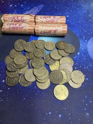 200 assorted vintage Chuck E Cheese tokens