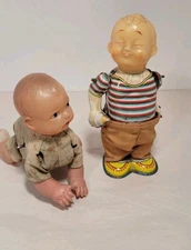 1950s Mikuni Japan Baby Boy Pulling Down Pants Wind-Up Tin Toy & Crawing Baby**