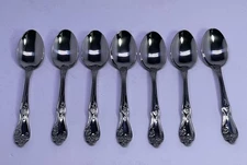 VINTAGE NEW ONEIDA 18/0 stainless Steel Set Of 7 Floral Glossy Dessert Spoons