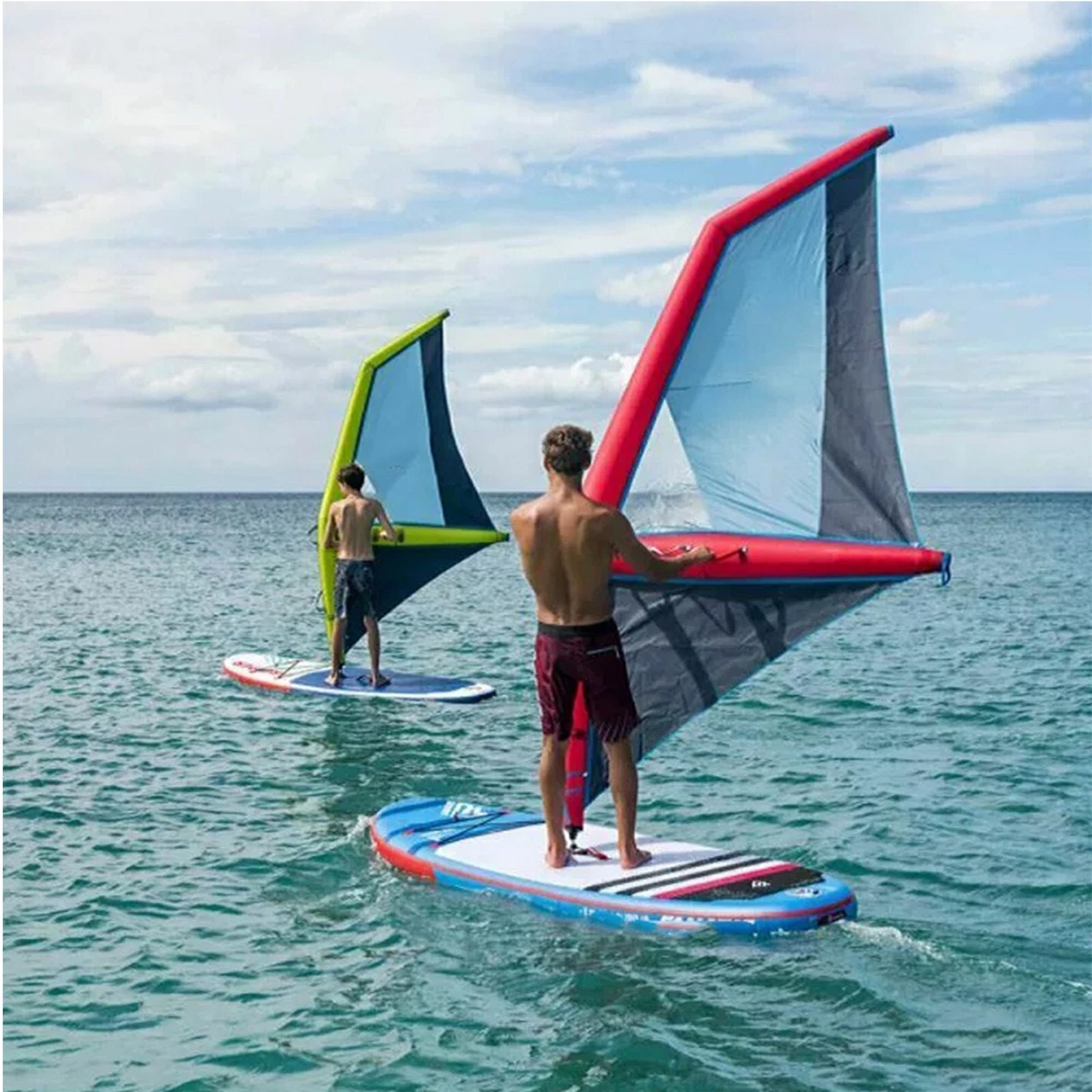 Surfing board with sail outlet