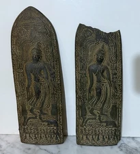 VINTAGE PAIR OF THAI BUDDHIST METAL PLAQUE SCULPTURE OF A FRAGMENT OR VOTIVE