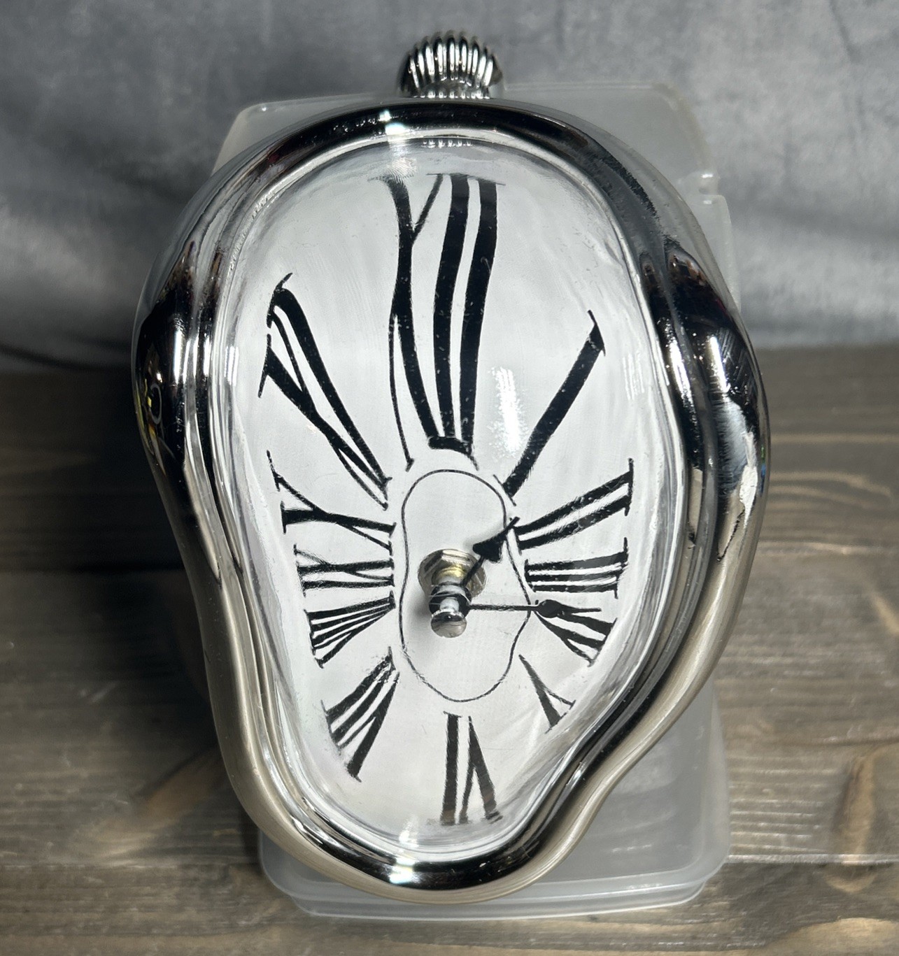 Salvador Dali Inspired Melting Wall Clock Silver Plastic Quartz Roman Numerals