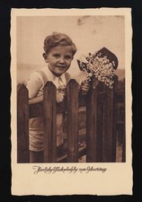 Fence gazer, boy with lily of the valley on the fence, birthday wishes Hamburg 29.8.1940