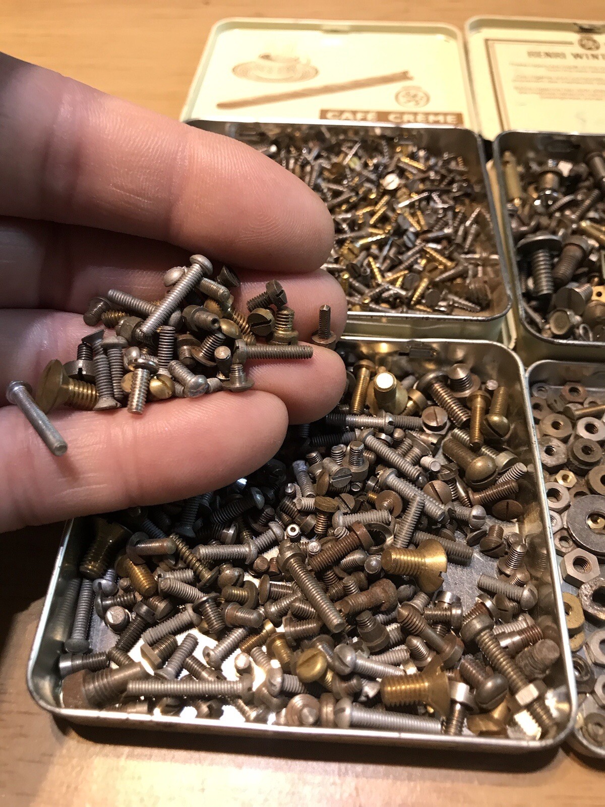 33R CLOCKMAKERS PARTS 4 X TINS OF VARIOUS SIZE CLOCK SCREWS NUTS