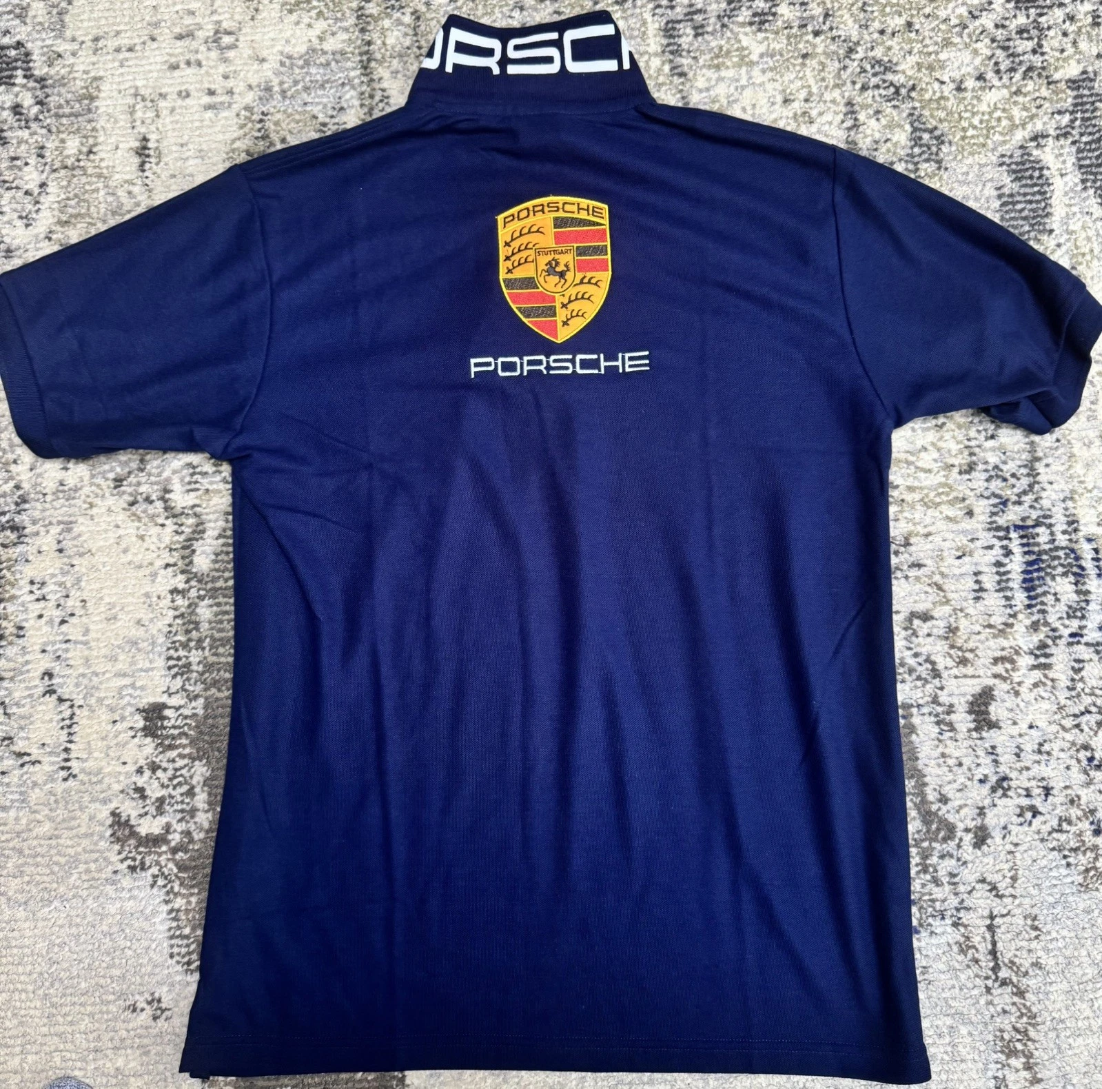 Porsche Dark Navy polo Shirt adult Size M , New With Tags
Opens in a new window or tab