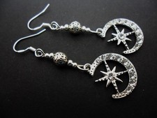 A PAIR DANGLY MOON/STAR EARRINGS WITH 925 SOLID SILVER HOOKS. NEW..