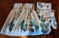 Tan Hanging Kitchen Dish Towel Set With Matching Oven Mitt And Washcloth.