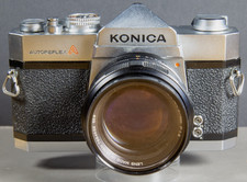 Konica Autoreflex T Camera Hexanon 57mm F 1.4 Lens case, lens blades sluggish.